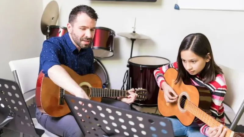 SMO for Guitar Teacher in London