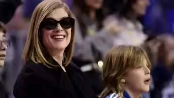 Rosamund Pike Makes Rare NBA Courtside Appearance